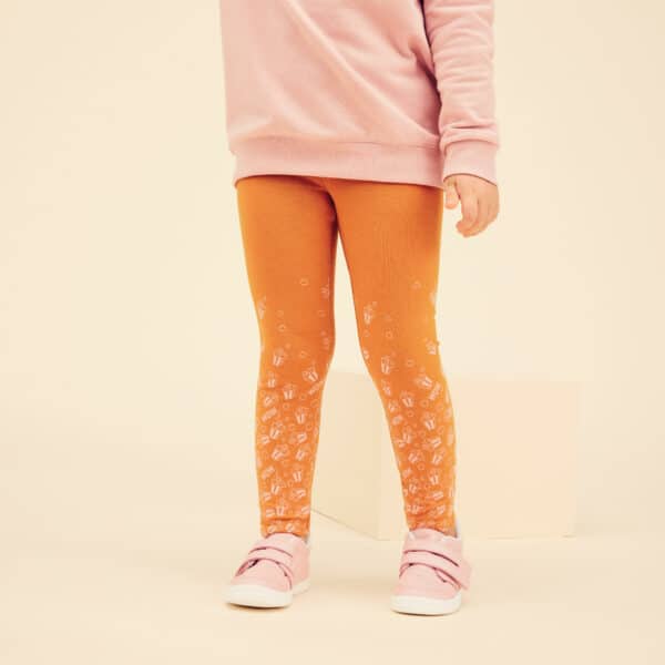 Leggings Basic Baumwolle Babyturnen Kinderturnen ockergelb mit Print
